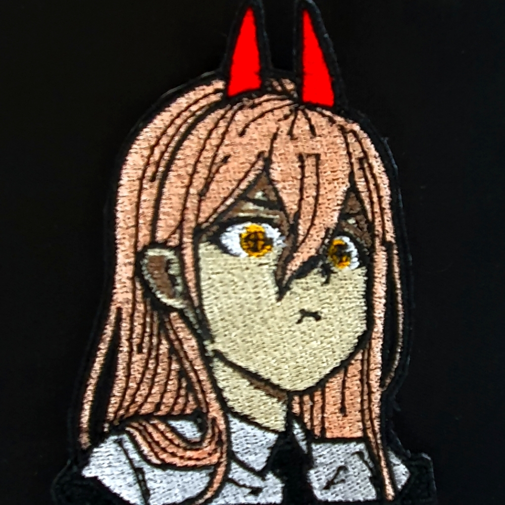Pouting Power from Chainsawman custom made iron on patch! Fresh off the embroi